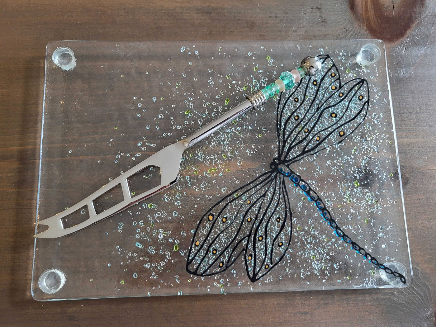 Photo of glass dish with butterfly decoration