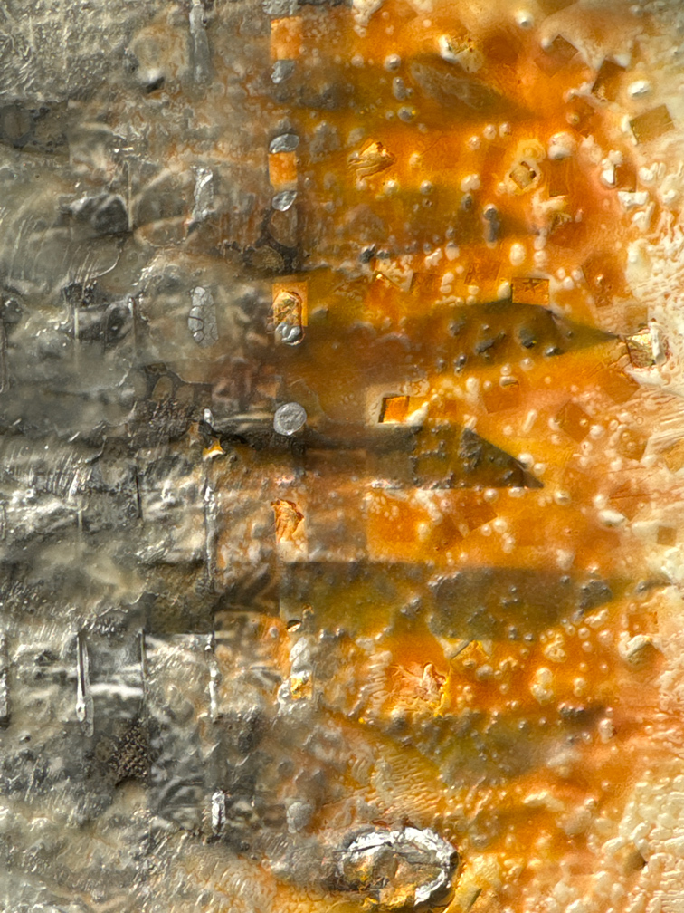 Abstract encaustic art collage in gold and dark grey